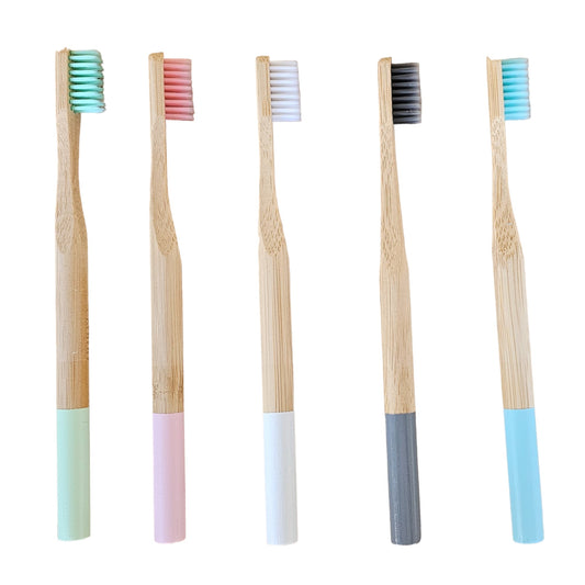 Bamboo toothbrushes in green, pink, white, grey and blue